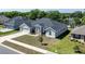 Inviting home with manicured lawn, spacious driveway and beautiful landscaping at 1922 Angel Fish Loop, Leesburg, FL 34748
