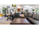 Cozy living room with comfortable seating, decor, and art at 1922 Angel Fish Loop, Leesburg, FL 34748