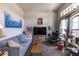 Cozy living room with carpet, comfortable seating, and an array of decorative accents at 1922 Angel Fish Loop, Leesburg, FL 34748
