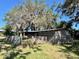 Charming outbuilding on a large, lush lot with mature trees at 19726 Mccall Rd, Altoona, FL 32702
