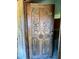 Ornate carved wood front door with decorative detailing adds classic charm at 19726 Mccall Rd, Altoona, FL 32702