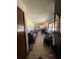 Hallway view showing tile floors leading into other rooms at 19726 Mccall Rd, Altoona, FL 32702