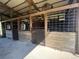 A horse stall with wood and metal grate, offering a secure and comfortable space for animals at 19726 Mccall Rd, Altoona, FL 32702