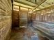 A wooden horse stall providing a safe and comfortable area for animals at 19726 Mccall Rd, Altoona, FL 32702