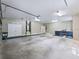 Spacious garage with high ceilings and ample room for storage at 2010 Otters Pond Rd, Fruitland Park, FL 34731