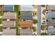 A bird's eye view showcases the arrangement of properties and landscaping in the neighborhood at 2095 Thornton Ter, The Villages, FL 32162