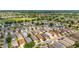 Aerial view of a well-maintained community, highlighting its lush landscaping and desirable location at 2095 Thornton Ter, The Villages, FL 32162