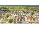 Aerial view of a well-maintained community, highlighting its lush landscaping and desirable location at 2095 Thornton Ter, The Villages, FL 32162