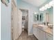 Bathroom with a modern vanity, tile flooring, and natural light at 2095 Thornton Ter, The Villages, FL 32162