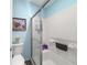 Clean bathroom with a shower over tub, white tiles, and efficient fixtures at 2095 Thornton Ter, The Villages, FL 32162