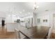 The dining area is connected to the kitchen and features wood-look tile and stainless steel appliances at 2420 Sr 471, Sumterville, FL 33585