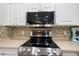 The kitchen features stainless steel appliances, including a microwave and oven at 2420 Sr 471, Sumterville, FL 33585