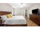Comfortable main bedroom with hardwood floors and a walkout to the Primary bathroom at 2420 Sr 471, Sumterville, FL 33585