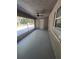 Enclosed porch offers an indoor-outdoor living space, and a bright view at 2420 Sr 471, Sumterville, FL 33585