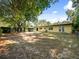 Expansive backyard offering ample space for outdoor activities and potential landscaping at 25519 Colmar Ave, Sorrento, FL 32776