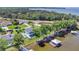 Stunning aerial of the home, boat dock and lake at 26516 Savage Cir, Howey In The Hills, FL 34737