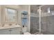 Well appointed bathroom with modern vanity and glass-enclosed shower at 26516 Savage Cir, Howey In The Hills, FL 34737