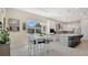 Eat in kitchen/dining area with large windows and a view of the neighborhood at 26516 Savage Cir, Howey In The Hills, FL 34737