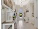 Bright entryway featuring light floors, neutral walls, decorative accents, and natural light at 26516 Savage Cir, Howey In The Hills, FL 34737