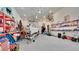 Large garage with boat, trailer, epoxy floors, and ample storage space at 26516 Savage Cir, Howey In The Hills, FL 34737