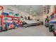 Spacious garage with boat on trailer, epoxy floors and overhead storage at 26516 Savage Cir, Howey In The Hills, FL 34737