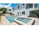 Well-maintained pool and spa with a spacious patio and outdoor seating areas at 26516 Savage Cir, Howey In The Hills, FL 34737