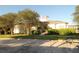 Beautiful community clubhouse with well-maintained landscaping, manicured shrubbery, and an inviting entrance at 292 Nautica Mile Dr, Clermont, FL 34711