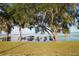 Lovely lake view with docks and plenty of lush trees at 292 Nautica Mile Dr, Clermont, FL 34711