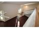 Living area showcasing hardwood floors, natural light, and a view of the staircase at 292 Nautica Mile Dr, Clermont, FL 34711