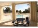 Community pool area with picnic table and chairs at 292 Nautica Mile Dr, Clermont, FL 34711