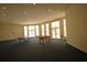 Expansive recreation room with ample natural light, ping pong and foosball tables for entertainment and enjoyment at 292 Nautica Mile Dr, Clermont, FL 34711