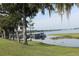 Beautiful waterfront with boat docks and lush greenery providing a scenic and tranquil lakeside experience at 292 Nautica Mile Dr, Clermont, FL 34711