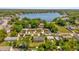 Aerial view of the home, neighborhood, and nearby lake at 2928 Delaney St, Orlando, FL 32806