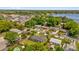 Aerial of home near lake with lush landscaping and neighborhood at 2928 Delaney St, Orlando, FL 32806