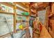 Basement storage area with wooden shelves and cinder block walls at 2928 Delaney St, Orlando, FL 32806