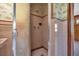 Retro pink-tiled bathroom with swan-etched glass door at 2928 Delaney St, Orlando, FL 32806