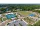 Community park with tennis courts, basketball court, soccer field, playground, and parking at 3002 Bethpage Loop, Mount Dora, FL 32757