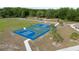 This image highlights the basketball court, a great recreational area for residents to enjoy outdoor activities at 3002 Bethpage Loop, Mount Dora, FL 32757