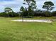 Outdoor sand volleyball court for recreational sports and community activities with green grassy surroundings at 30554 Quince Ave, Eustis, FL 32736