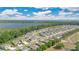 A masterfully planned community offering single-Gathering homes and pristine streets near lake and lush landscaping at 31799 Broadwater Ave, Leesburg, FL 34748