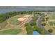 A scenic aerial showing the baseball complex, lake views and walking paths that enhance community living at 31799 Broadwater Ave, Leesburg, FL 34748