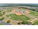 An aerial view showcasing a baseball complex with multiple fields, maintained landscaping and parking at 31799 Broadwater Ave, Leesburg, FL 34748