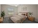 Stylishly decorated bedroom with a comfortable bed and coordinating side tables at 3305 Dzuro Dr, Oxford, FL 34484