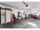 Spacious two-car garage features laundry, storage, and an extra refrigerator at 333 Stanley Bell Dr, Mount Dora, FL 32757