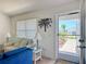 Cozy living room featuring bright furnishings and a view to the outside at 3614 Auburndale Ave, The Villages, FL 32162