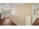 Bright loft area with wood flooring, neutral walls, and natural light, offering a versatile and inviting space at 3630 Oak St, Mount Dora, FL 32757