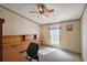 Bedroom with natural light, desk and chair, and light colored walls at 37945 Monticello St, Leesburg, FL 34788