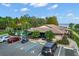 Community center with a pool, parking and lush landscaping in a serene setting at 37945 Monticello St, Leesburg, FL 34788