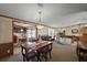 Inviting dining area with a dining table, chairs, and seamless flow to the kitchen and living room at 37945 Monticello St, Leesburg, FL 34788