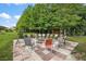 Inviting outdoor fire pit area with seating for gatherings and relaxation at 37945 Monticello St, Leesburg, FL 34788